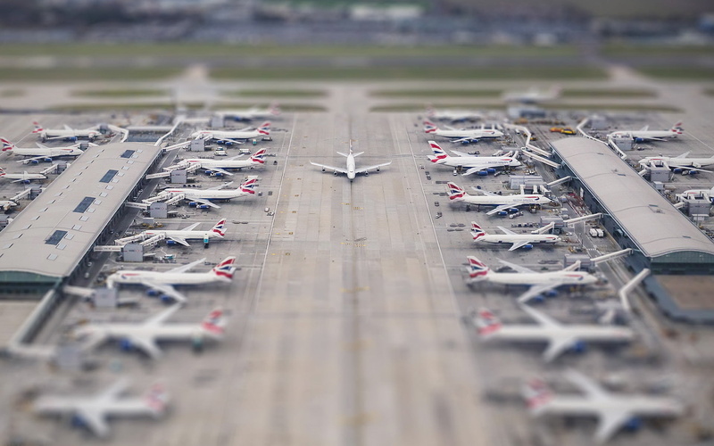 aerospace industry, outdoors, diorama, selective focus, airport runway, in a row, nature, airport, aerial view, no people, travel, air vehicle, terminal