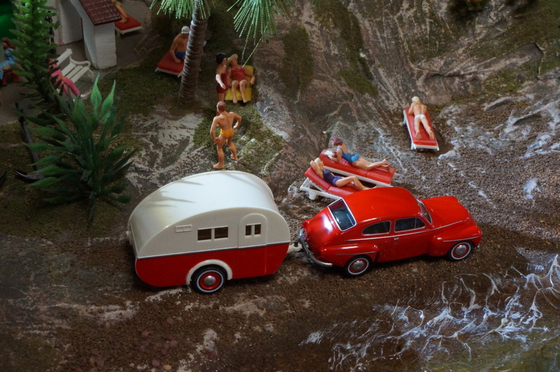 tree, men, transportation, caravan, group of people, motor vehicle, model railway, holiday, rock, representation, model train, car, plant, italy, high angle view