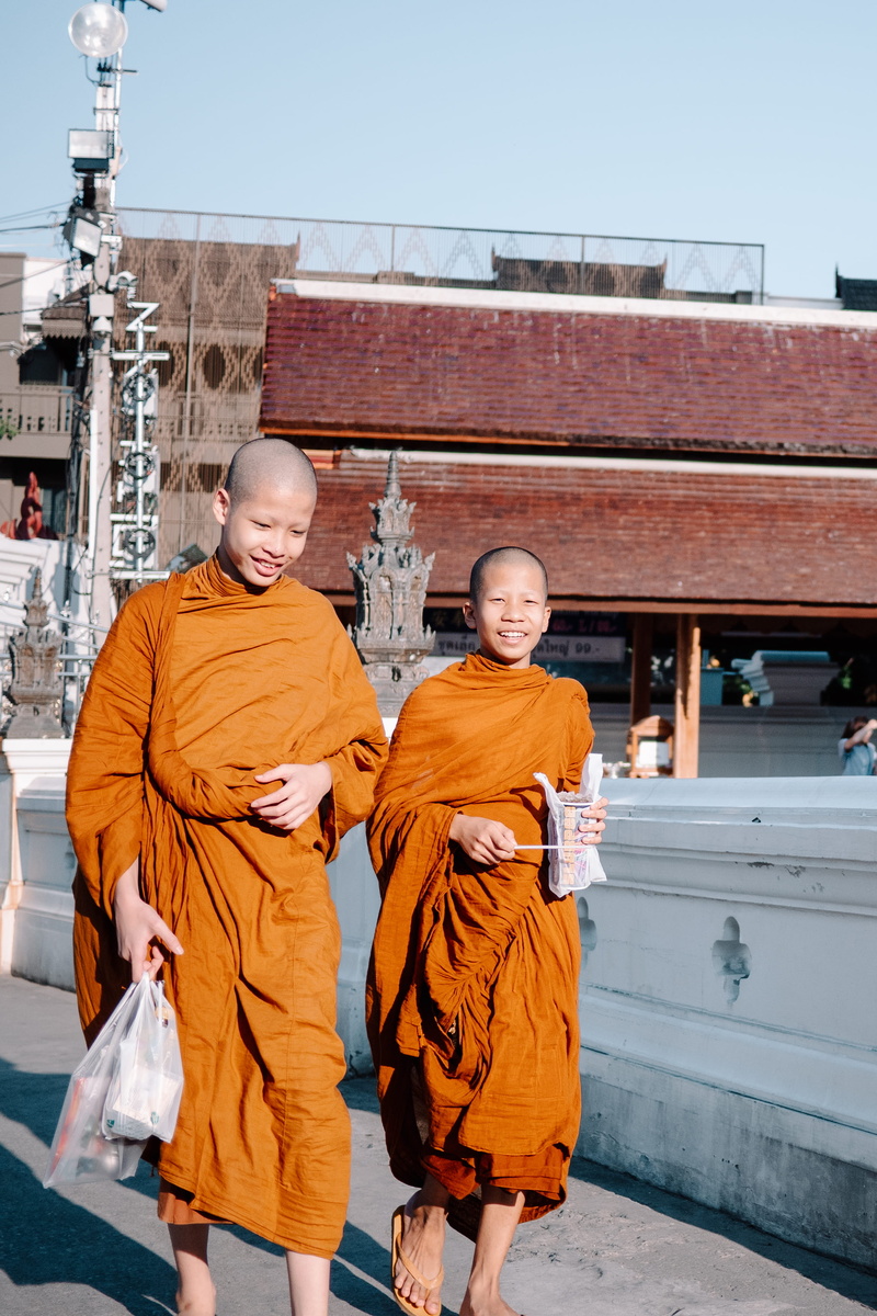 metropolis, child, bags, urban, portrait, human, apparel, chiangmai, religion, front view, traditional clothing, temple, chiang mai, white, built structure
