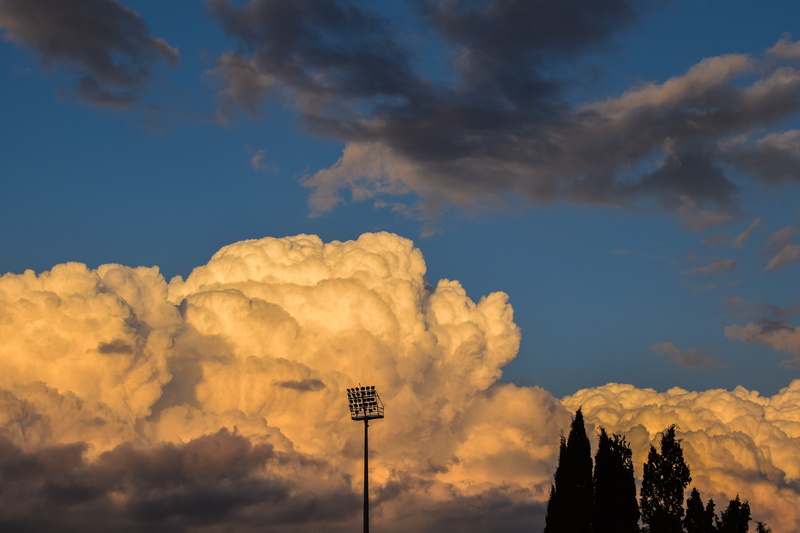 dramatic, no people, flood light, environment, sky, architecture, outdoors, low angle view, nature, idyllic, clouds, sunset, trees, scenics - nature, afternoon