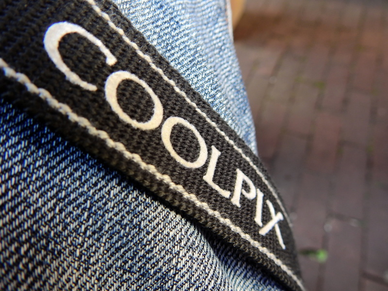 casual clothing, sweater, outdoors, white color, photo belt, decoration, day, clothing, pants, no people, deco, nikon, blue, textile, wool, close-up, jeans