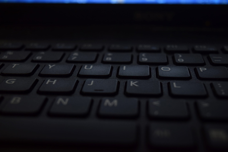 display, computer key, selective focus, portable, black color, blur, text, communication, alphabet, black, letters, indoors, keys, close -up, dark, computer