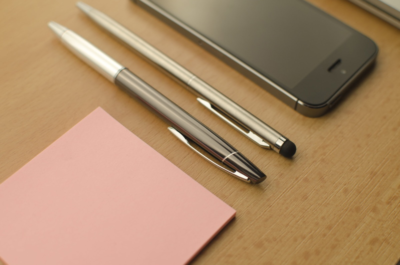 smartphone, writing instrument, portability, high angle view, wireless technology, writing, beside, group of objects, indoors, two, screen, pen, desk, cellphone