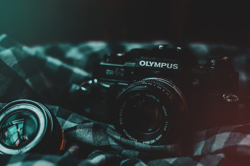 close-up, bridge, lenses, wristwatch, shirt, focus on foreground, machine, wild, 1980, technology, olympus, text, camera lens, equipment, camera, italia