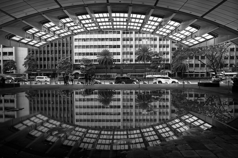 ceiling, reflection, building exterior, water, large group of people, geometry, urban, day, city, adult, transportation, daily life, modern, luxury, beautiful