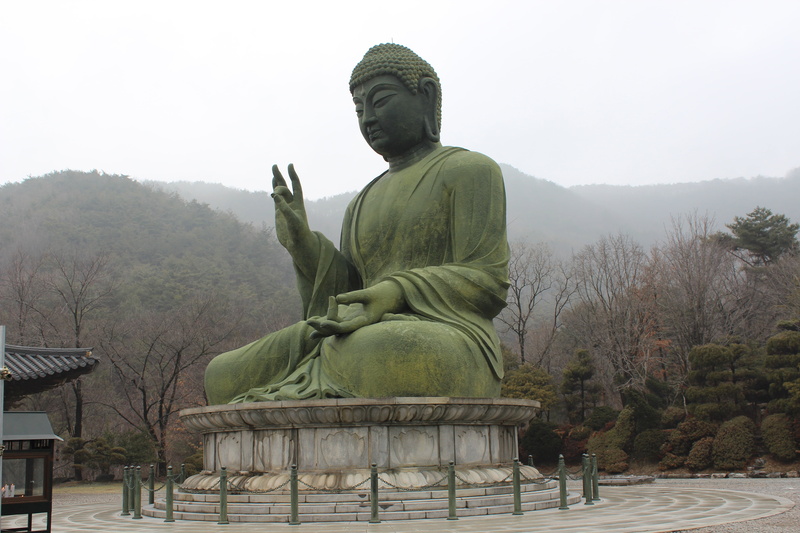 statue, 5K, human representation, taejo mountain, sky, fog, architecture, tree, male likeness, day, representation, plant, bronze amitabha statue, nature
