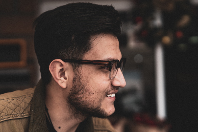 adult, pub, face, goggles, hairstyle, close-up, musical instrument, man, bar counter, contemplation, one person, human face, eyeglasses, beard, headshot