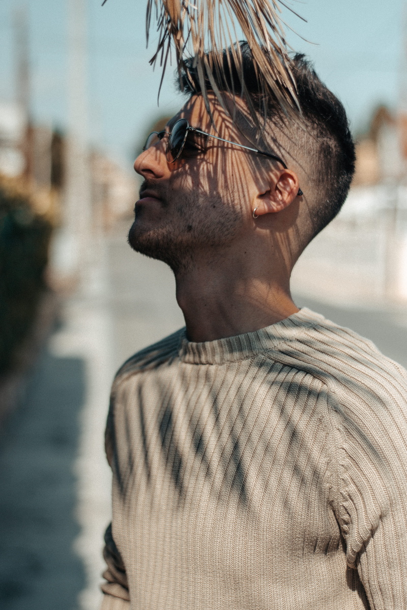 lifestyles, 5K, day, palm, boy, glasses, one person, nature, sun, portrait, facial hair, leaves, young men, home decor, wearing, hairstyle, clothing, males