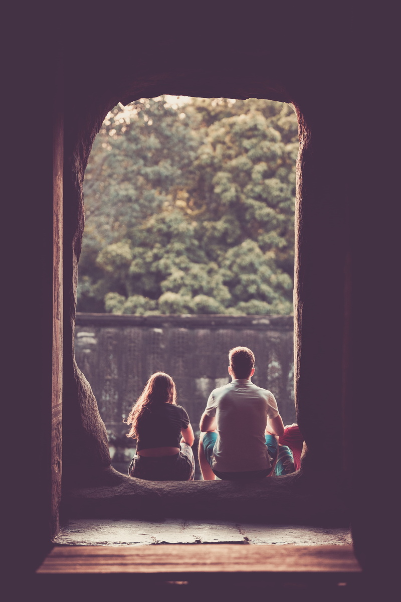 thinking, men, angkor wat, sitting, leisure activity, two people, looking at view, view, adult, people, outlook, sit, temple, real people, rear view, cambodia