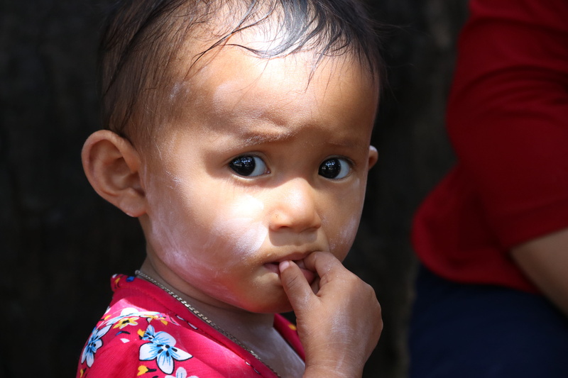 headshot, looking at camera, cambodia, childhood, toddler, one person, 5K, front view, lifestyles, focus on foreground, cute, krong siem reap, portrait