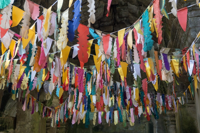low angle view, textile, large group of objects, choice, religion, holy, abundance, bunting, outdoors, hanging, side by side, variation, krong siem reap
