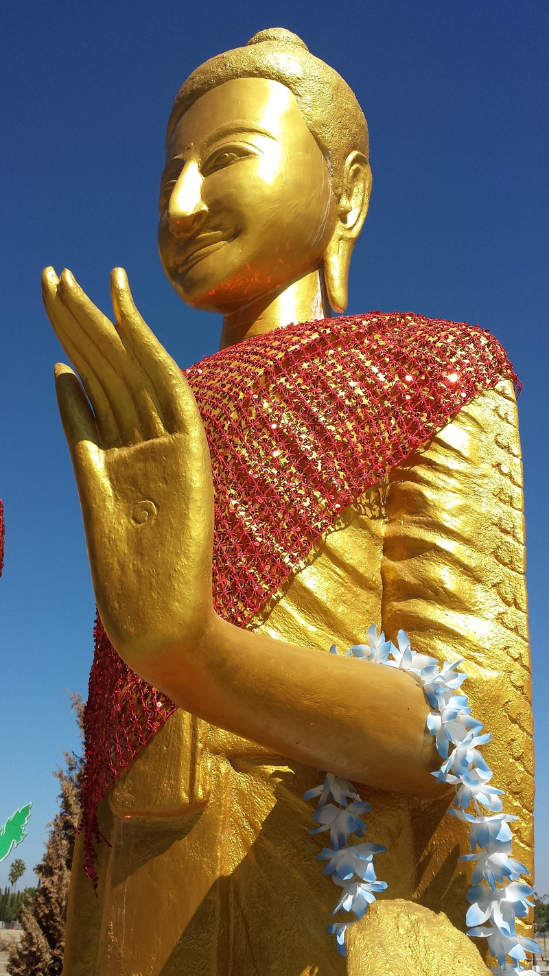 representation, low angle view, gold colored, blue, sunlight, religion, nature, sky, stockton, cambodian, art and craft, day, buddhist, human representation