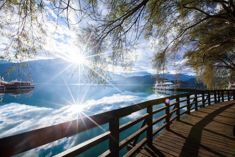 sky, architecture, sunny, swimming pool, beauty in nature, scenics - nature, water, brightly lit, sunbeam, tranquility, lens flare, streaming, sun moon lake