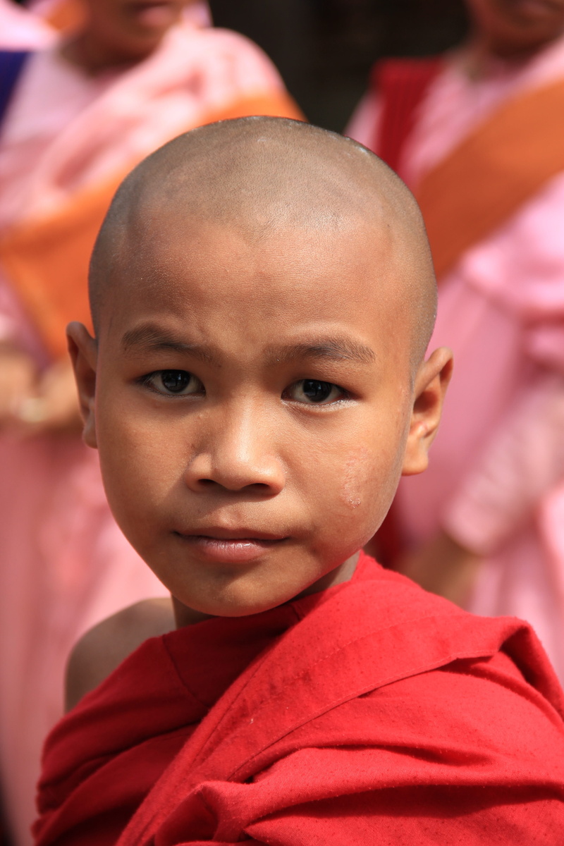 boy, real people, child, 5K, pagoda, front view, Buddhism, red, focus on foreground, men, day, lifestyles, close-up, childhood, innocence, robe, wearing
