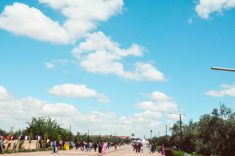 street, outdoors, marrakech, morocco, marrakesh, blue, built structure, lifestyles, architecture, 4K, real people, walking, clouds, blue sky, leisure activity
