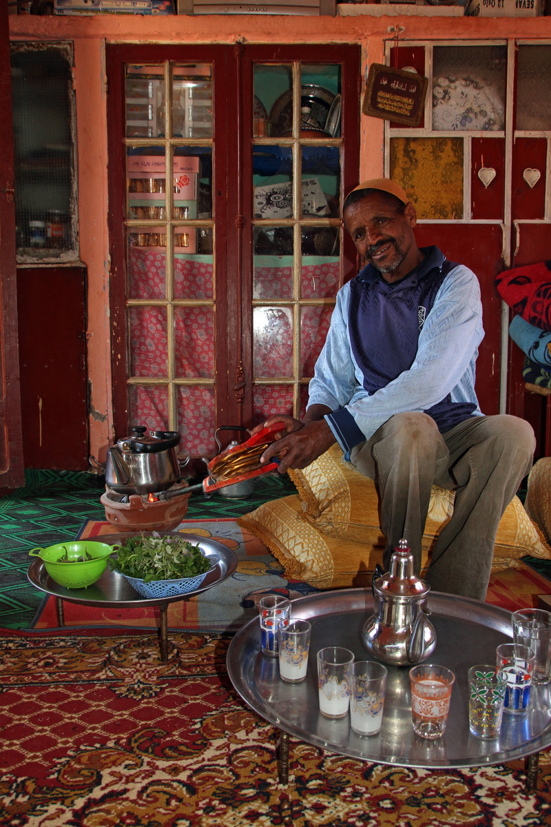 smiling, marrakesh, adult, male, table, looking at camera, full length, casual clothing, travel, man, leisure activity, food and drink, food, real people