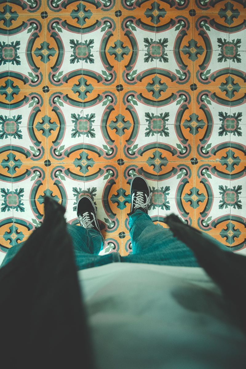 tiles, tiled floor, personal perspective, jeans, unrecognizable person, shoe, one person, colorful, marroko, morocco, indoors, selective focus, design