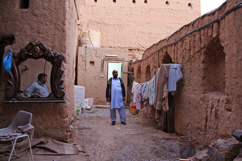 alley, village, people, creativity, travel, building, day, building exterior, architecture, art and craft, full length, construction, al hamra, oman, ancient