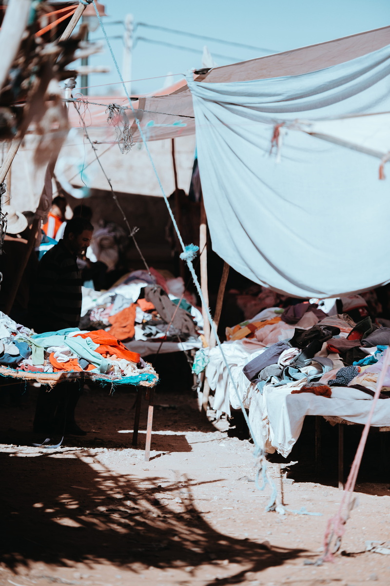 nature, tents, pegs, stall, selective focus, no people, textile, messy, dry, pollution, outdoors, fabric, inside, nautical vessel, hanging, market, day