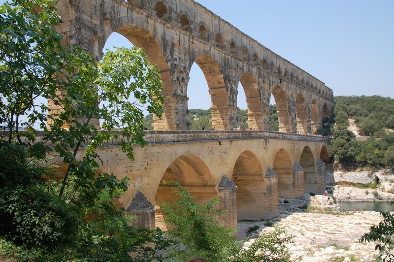 sky, day, travel, ancient civilization, holiday, pont du gard, outdoors, architecture, bridge, france, tourism, built structure, arch, arched, clear sky