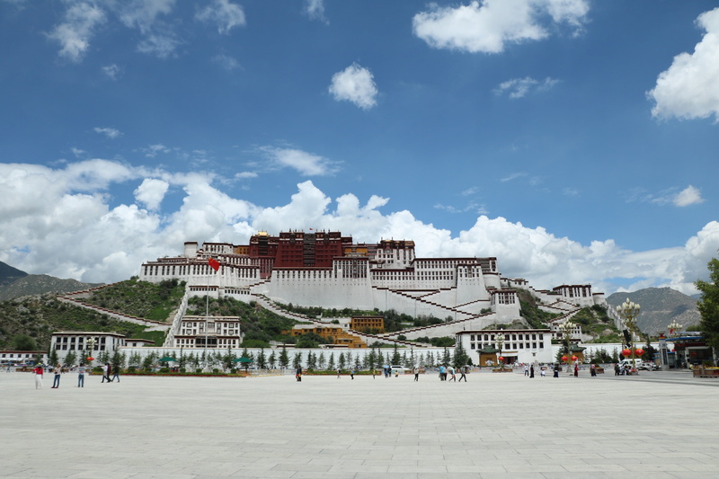 incidental people, cloud - sky, women, nature, travel destinations, potala, day, city, tourism, blue sky, architecture, cloth house, cultures, built structure