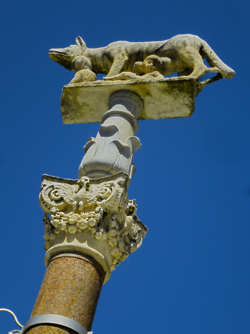no people, old, history, travel destinations, blue, monument, clear sky, belief, place of worship, the past, italy, she-wolf, statue, sculpture, spirituality