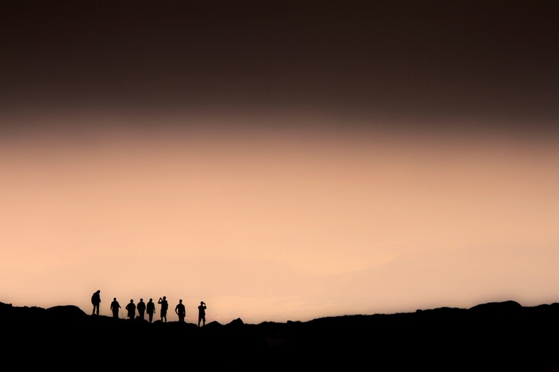road, watching, copy space, ground, tranquil scene, view, outdoors, group, nature, way, standing, national park, silhouette, summer, path, mountain, group of people