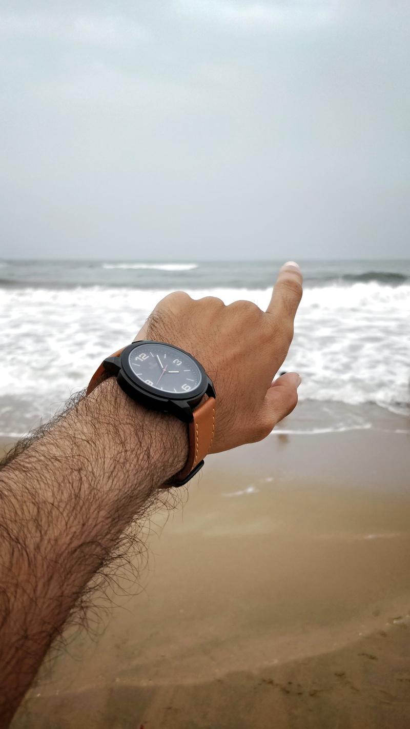 coastal, seashore, nature, real people, lifestyles, men, arm, horizon over water, time, sea, watch, outdoors, land, wristwatch, sand, body part