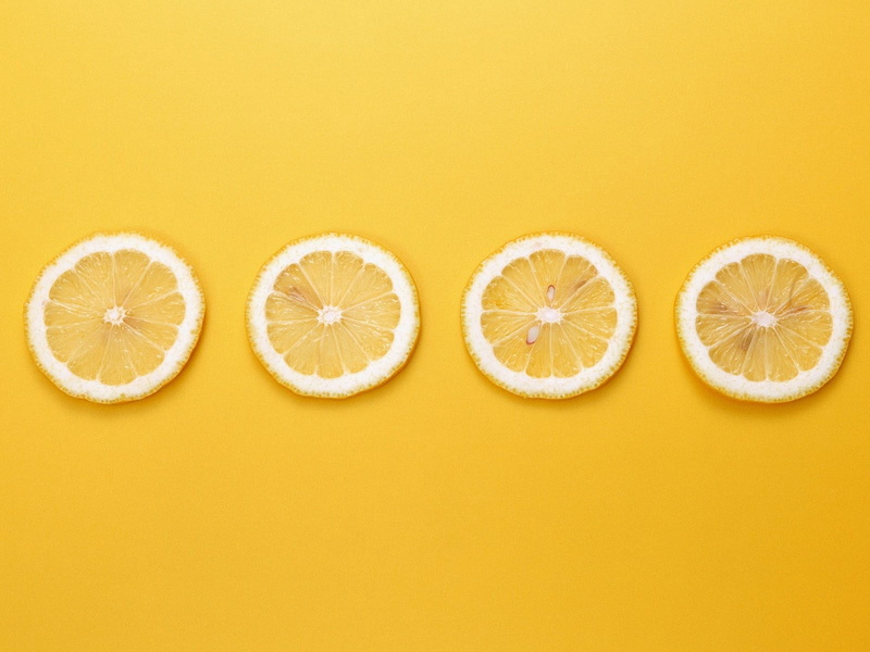 yellow background, food And Drink, no People, directly above, slices, yellow, indoors, orange - fruit, backgrounds, studio shot, fruit, cross Section, ripe