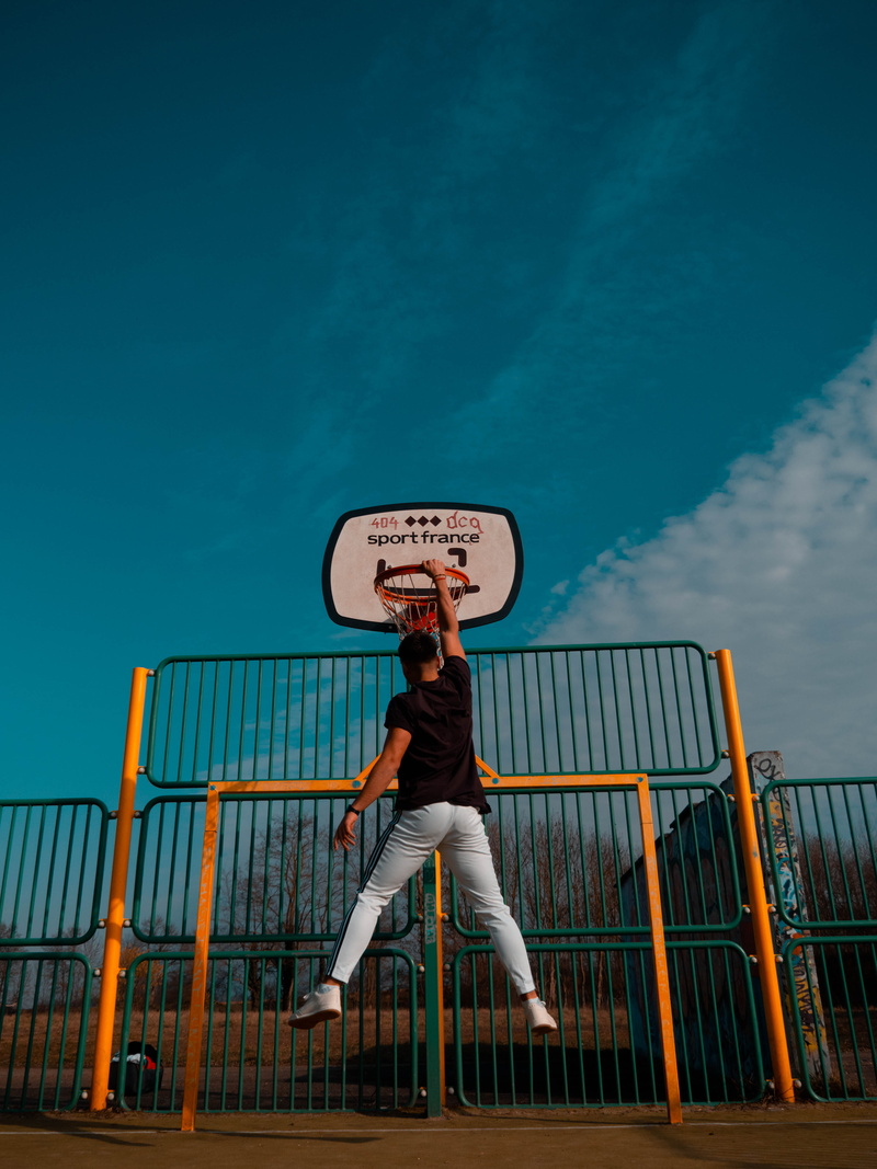 lifestyles, leisure activity, architecture, cloud - sky, man, railing, 4K, banister, dunking, full length, people, person, play, trampoline, clothing
