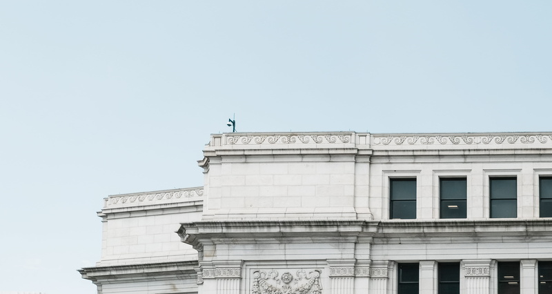 built structure, architectural column, building, clear sky, looking up, column, gray, high, union station, nature, urban, travel, court, city, outdoors