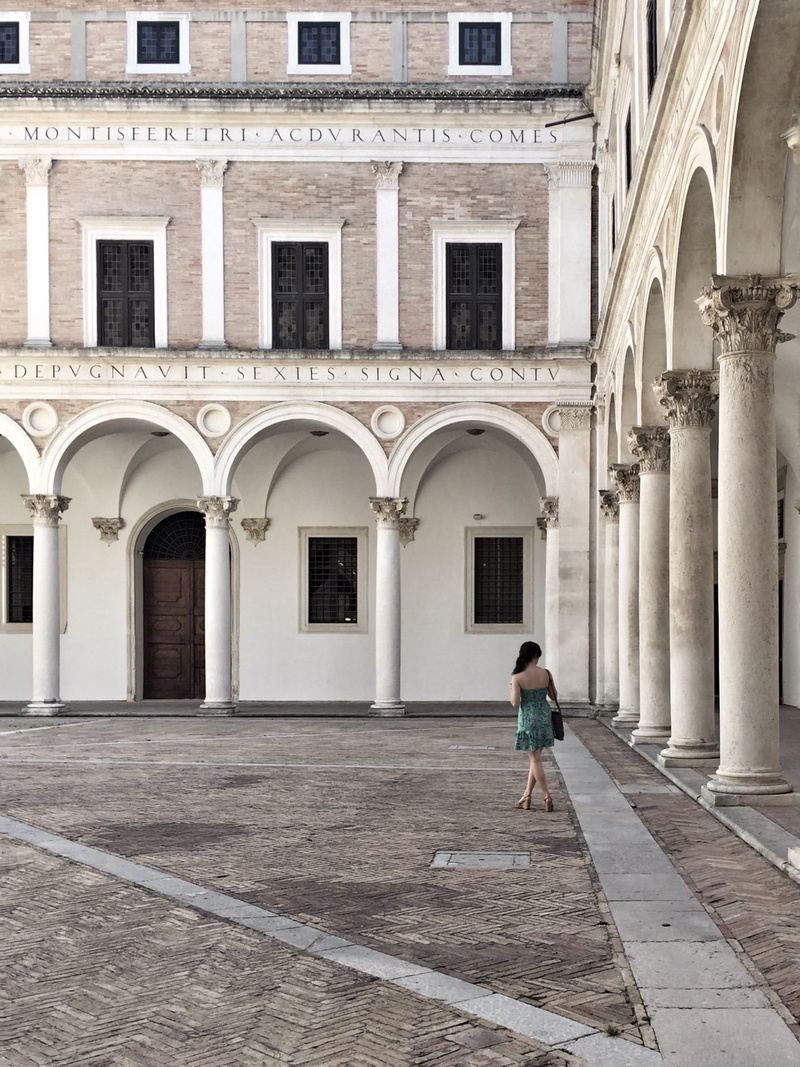 building exterior, renaissance, arch, full length, walking, history, women, standing, renaissance architecture, rear view, leisure activity, casual clothing