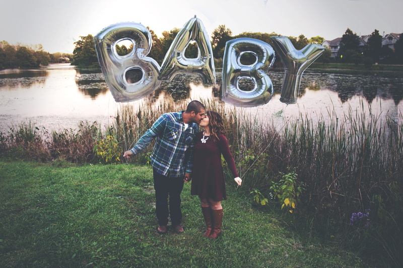 males, water, woman, plant, balloons, lake, casual clothing, lifestyles, real people, baby, standing, trees, leisure activity, grass, mylar, photography themes