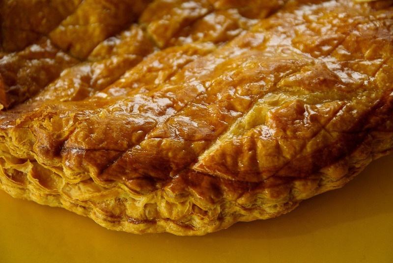 indoors, french food, baked, table, food and drink, high angle view, freshness, close-up, healthy eating, pattern, meat, yellow, pastry, still life, snack