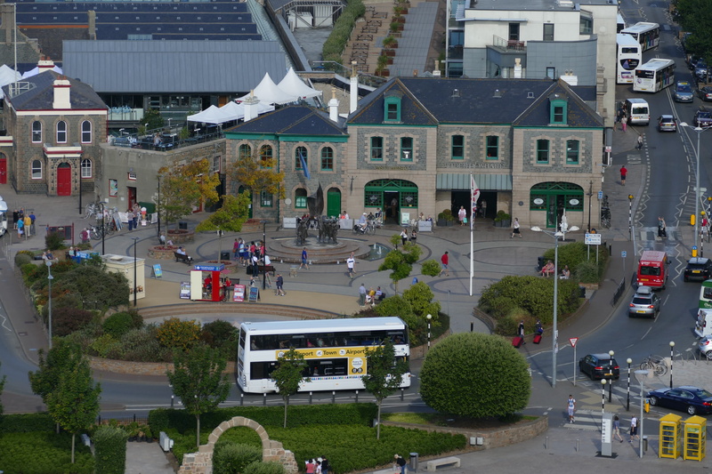 Capital, crowd, street, city, built structure, island of jersey, road, architecture, motor vehicle, outlook, monument, St Helier, building exterior, incidental people