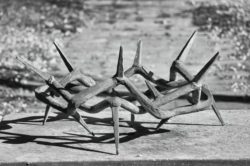 animal themes, water, outdoors, monument, focus on foreground, artists, sculpture, field, insect, nature, land, artwork, close-up, wood - material, metal