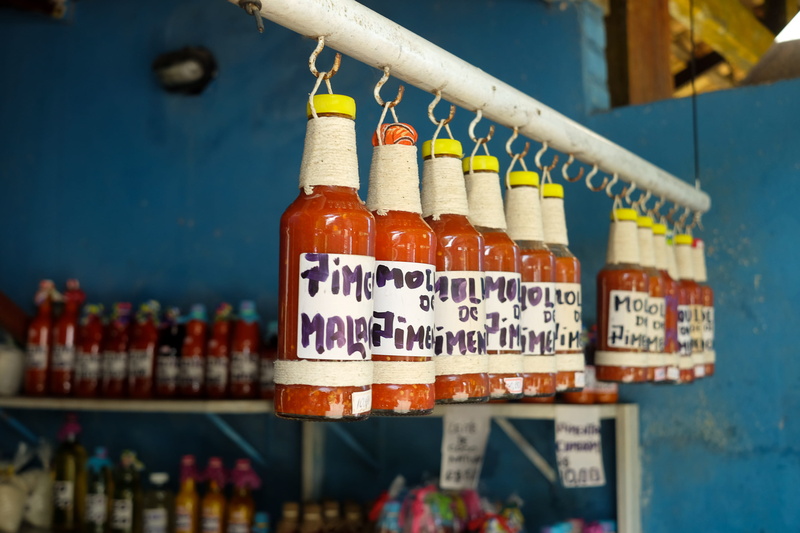 in a row, piment, no people, order, still life, chlili, chilli, bottle, large group of objects, day, trancoso, indoors, brazil, retail, choice, variation