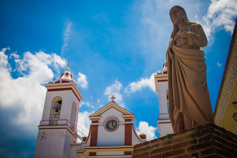 outdoors, door, travel, human representation, history, cross, place of worship, cloud - sky, historic, no people, building, tourism, religion, cathedral
