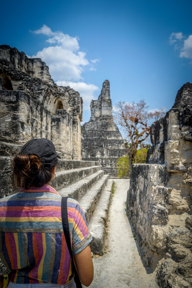 tikal, day, outdoors, person, 5K, real people, couple, history, the past, wall, building exterior, hair, ancient, hairstyle, civilization, pants, rock