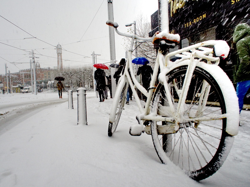 transportation, ice, bike, men, sport, road, building exterior, travel, bicycle, land vehicle, real people, mode of transportation, cold temperature, walk