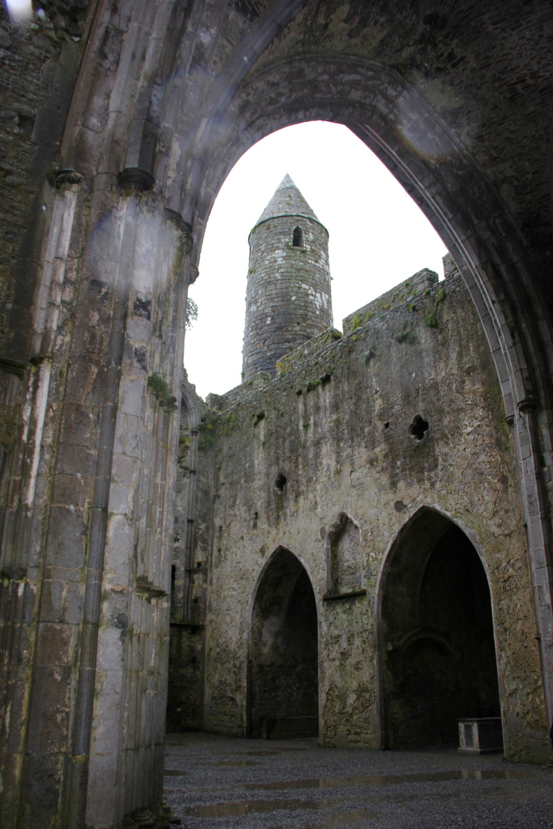 old, abbey, rock of cashel, abandoned, ruined, no people, steeple, arch, building exterior, travel, arched, architectural column, stonework, history, worship