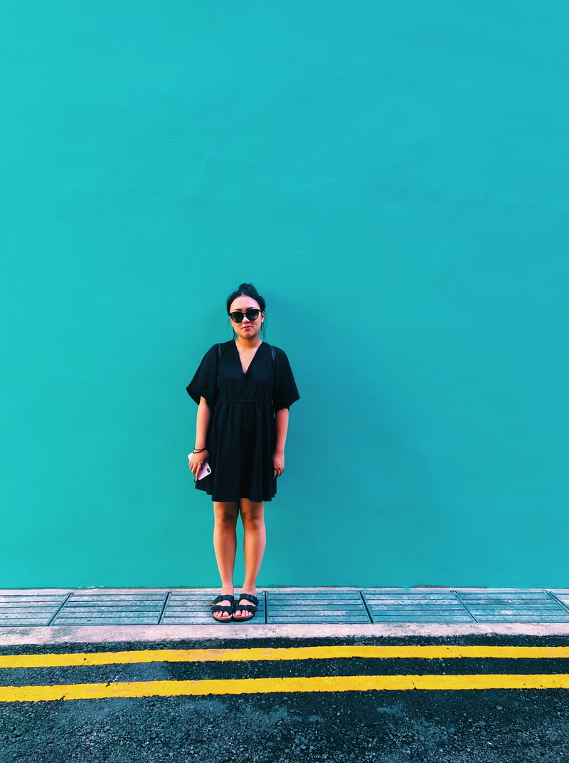 smartphone, accessories, leisure activity, sunglasses, standing, clothing, wall - building feature, girl, holding, asian, day, vietnamese, portrait, blue
