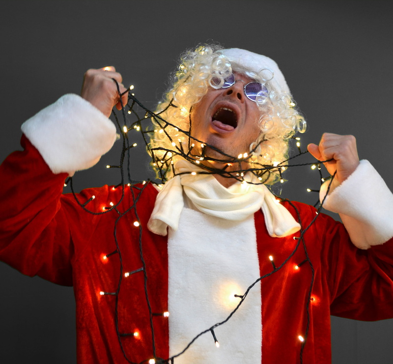 males, celebration, choking, human body part, portrait, wrapped around, the past, studio shot, man, senior adult, santa, christmas, black background, advent