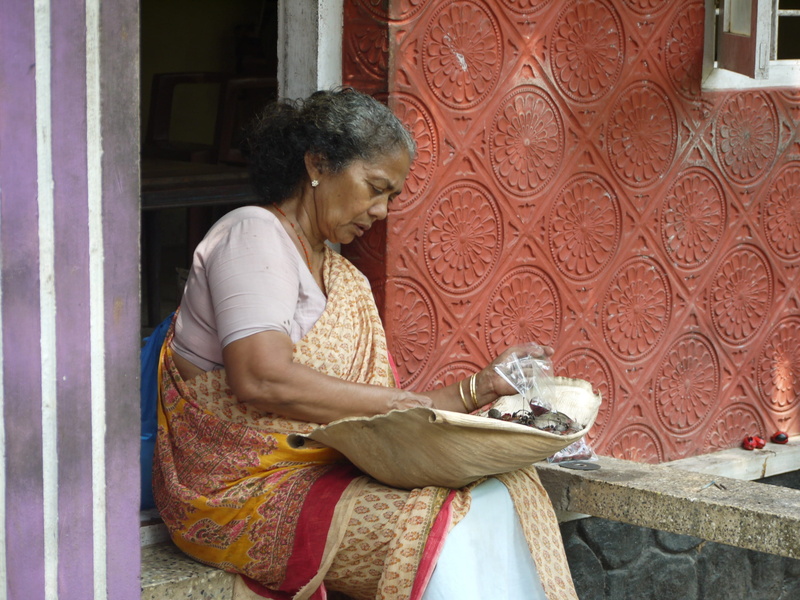 india, woman, leisure activity, artist, outdoors, people, senior women, architecture, wearing, cochin, mature adult, cultures, skill, real people, holding