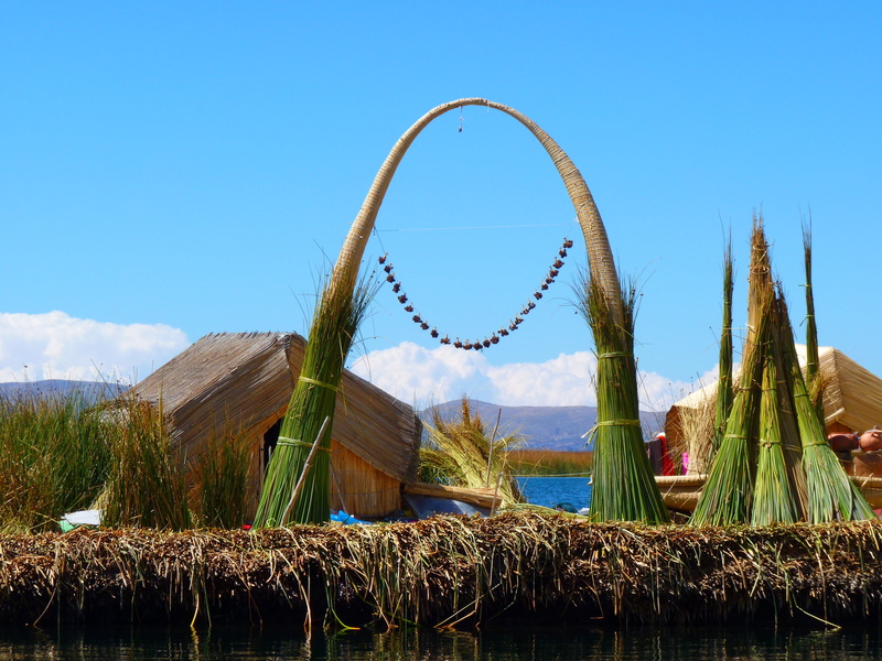 tranquil scene, lake titicaca, no people, rush, day, beauty in nature, tranquility, reed, field, cloud - sky, reed island, scenics - nature, architecture