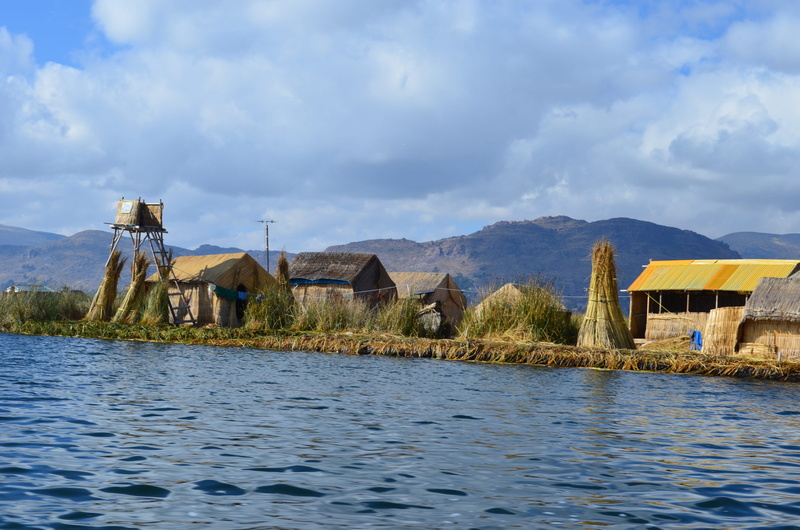 beauty in nature, sky, lake, titikaka, scenics - nature, building, built structure, day, island, no people, waterfront, floating, cloud - sky, building exterior