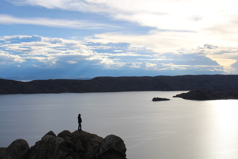 solid, one person, rock - object, rock, mountain, leisure activity, looking at view, sunset, non-urban scene, scenics - nature, lake, lifestyles, real people