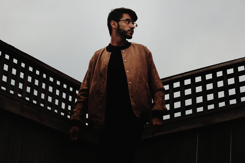 railing, one person, dark, photography idea, canon, fence, three quarter length, button, pose idea, wooden, architecture, waist up, portrait, street photography
