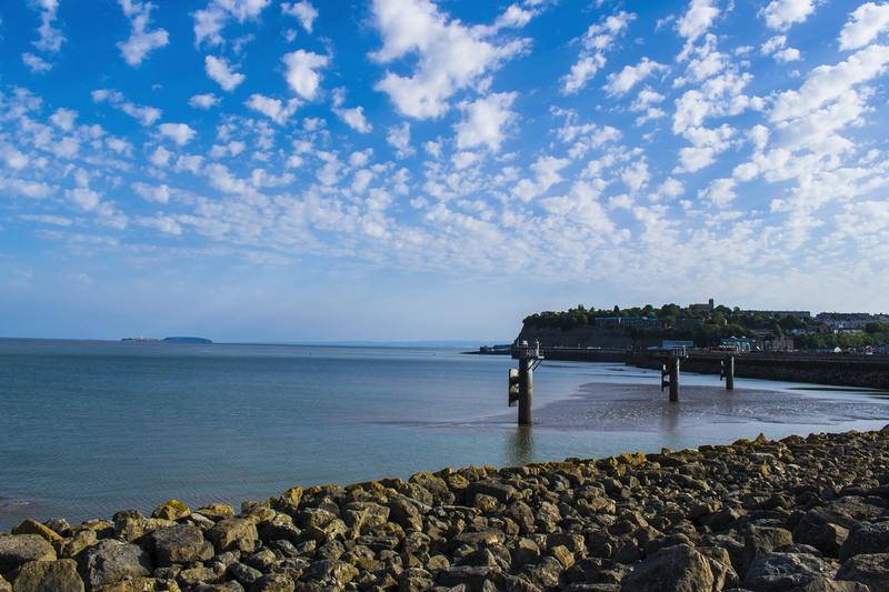 cardiff bay, horizon, beauty in nature, bay, architecture, cloud - sky, groyne, lying, lutheran, rock, land, gate, horizon over water, marine, tranquility