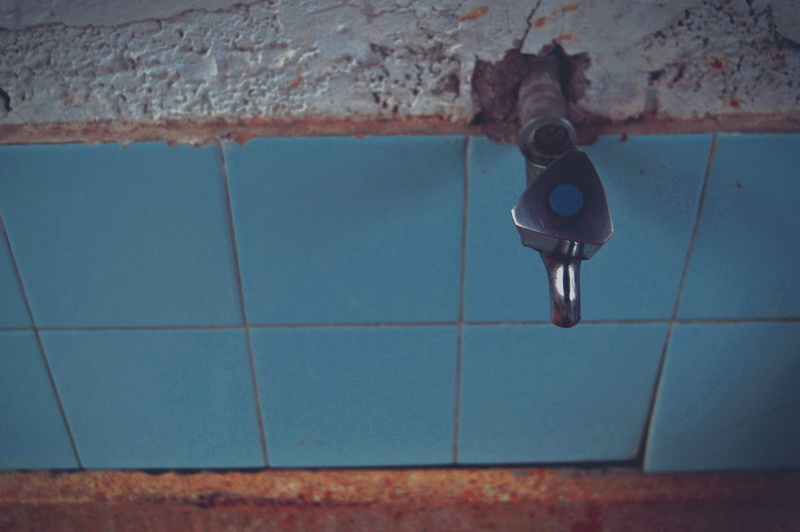 built structure, wall - building feature, old, tiled floor, technology, blue, lighting equipment, water tap, hanging, 5K, day, tile, indoors, flooring